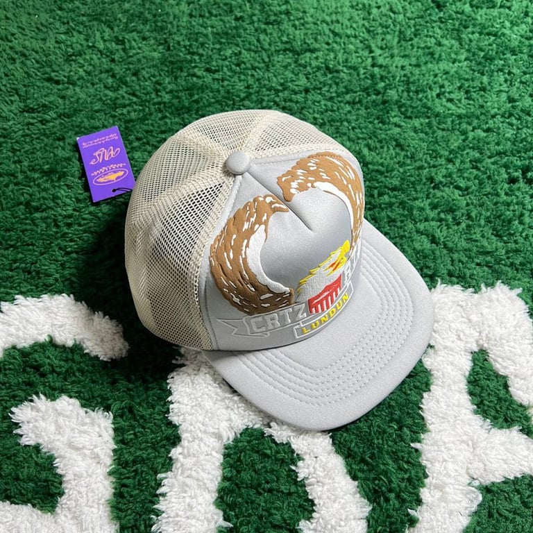 Corteiz Eagle Silver Trucker Hat