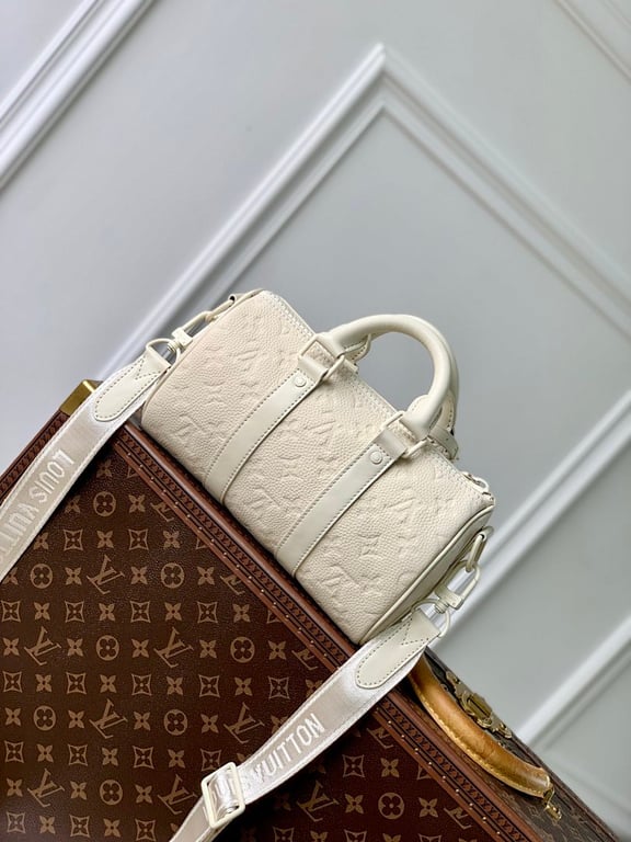 Louis Vuitton Keepall 25 Monogram Taurillon White - 7