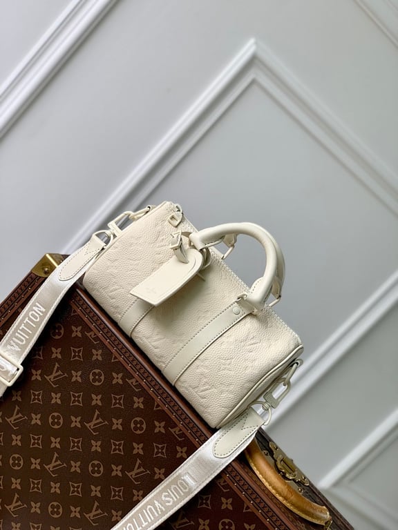 Louis Vuitton Keepall 25 Monogram Taurillon White - 9