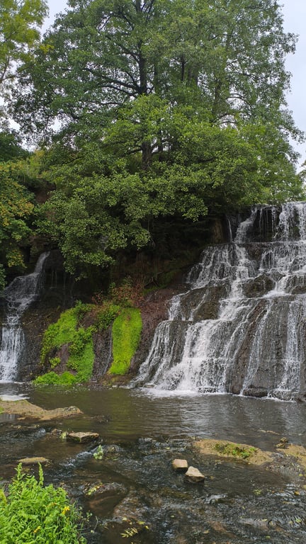 Dzhurinskiy Waterfall or Chervonohorod Waterfall. Nyrkiv village