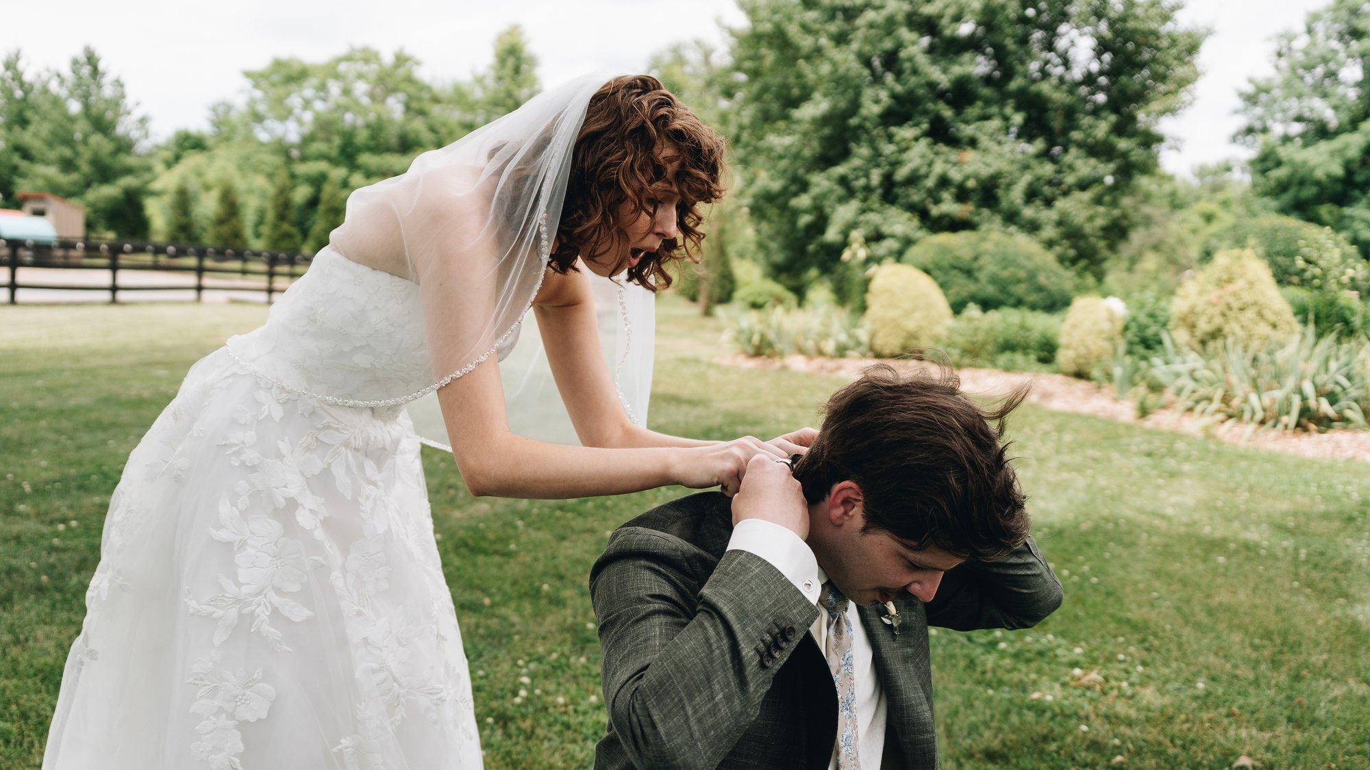 The groom doubled over laughing on the lawn after seeing the stitched date