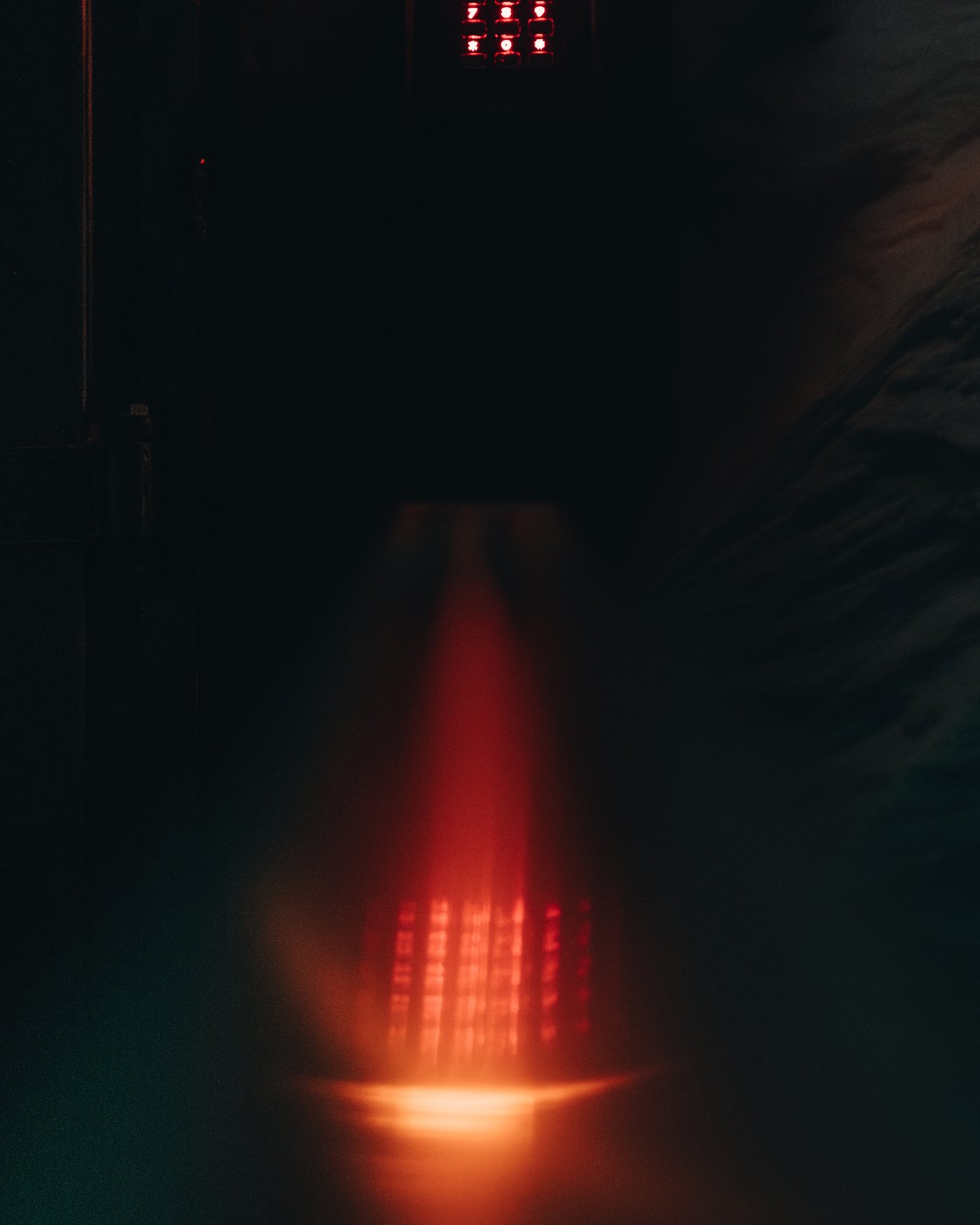 The Seed Vault's light, caught as a reflection. I got to put a hand on its door.
