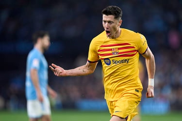 Lewandowski nets brace as Barcelona secure win over Celta Vi