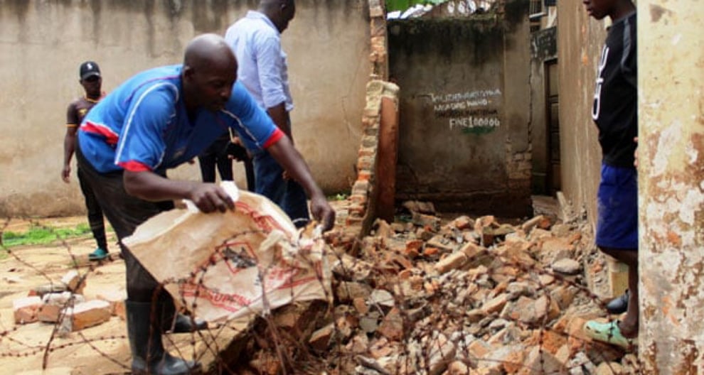 School Fence Crushes Woman To Death