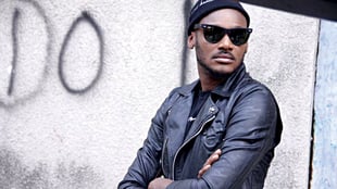 Singer 2Baba Etches Kids' Names On His Arm