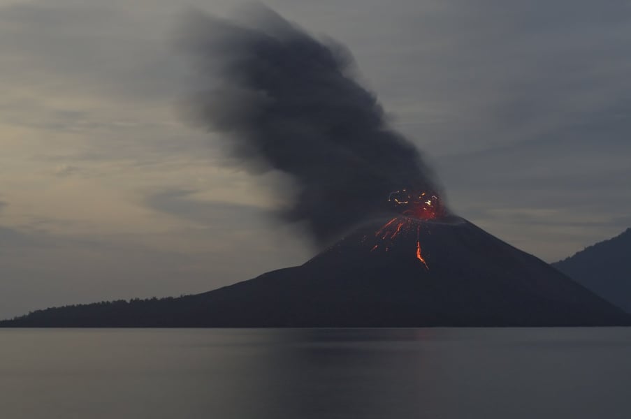 Volcano Erupts In Indonesia, Unleashes Twin Fury, Dark Cloud