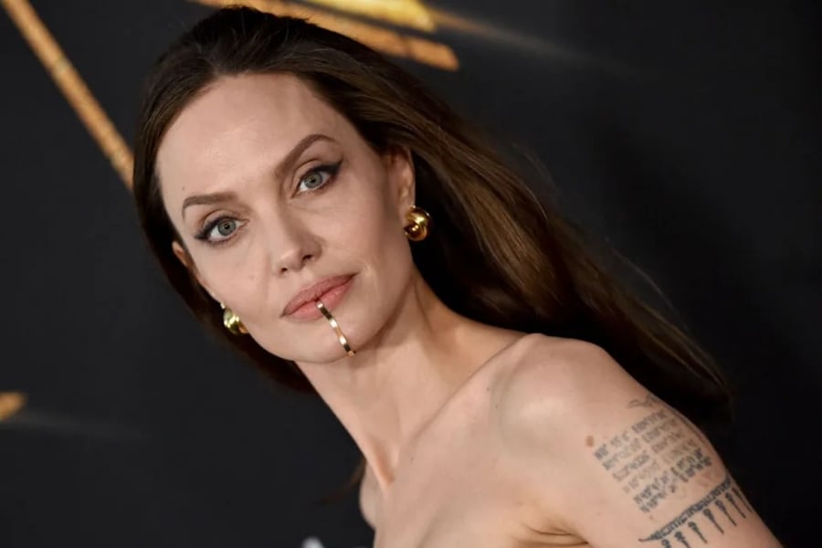 How Angelina Jolie Stole The Show With Bizarre Chin Cuff At 