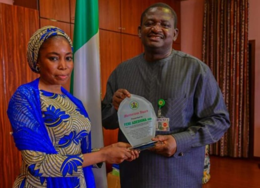 Femi Adesina Receives Service Recognition Plaque From Studen