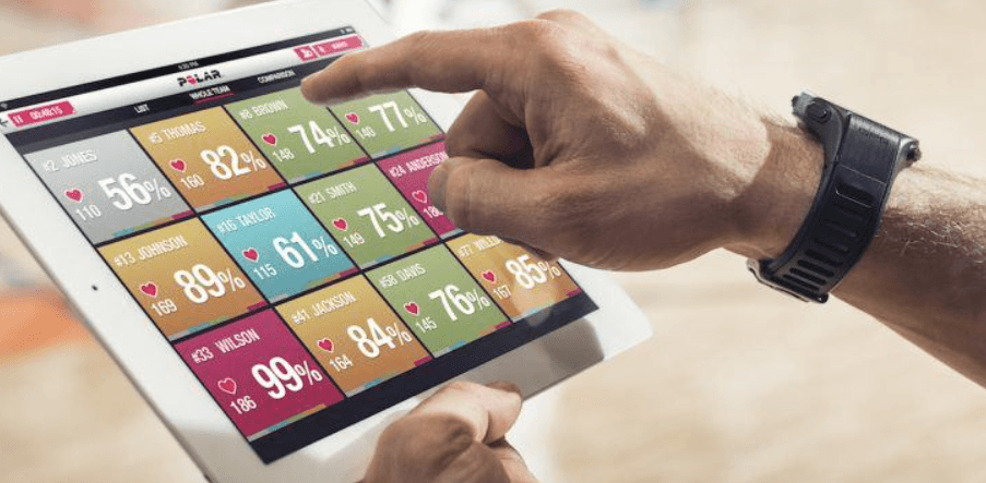 man-with-polar-on-tablet-and-mystery-watch-smileyface