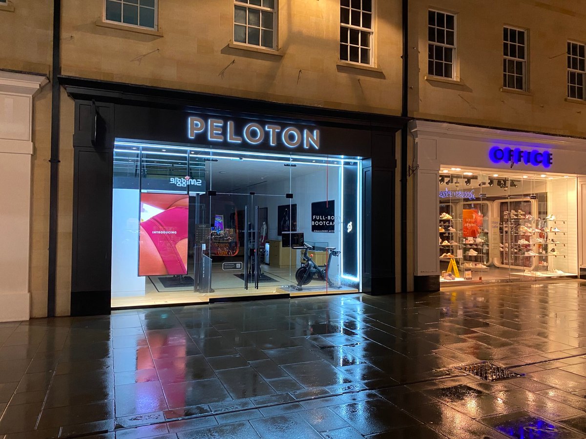 eloton retail store in Bath UK with exercise bikes and Garmin watch display