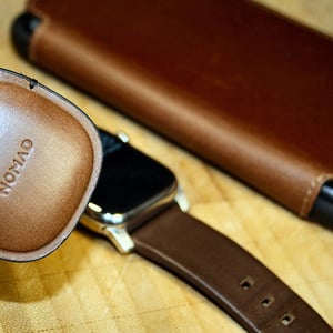 Nomad Goods Apple Watch Foilio case and brown active strap pro and airtag