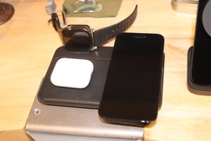 NOMAD base station charging AirPods