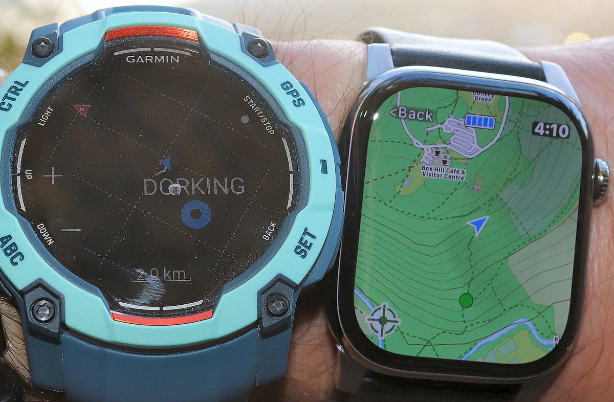 armin Instinct 3 breadcrumb route next to an Apple Watch running Workoutdoors with contour maps