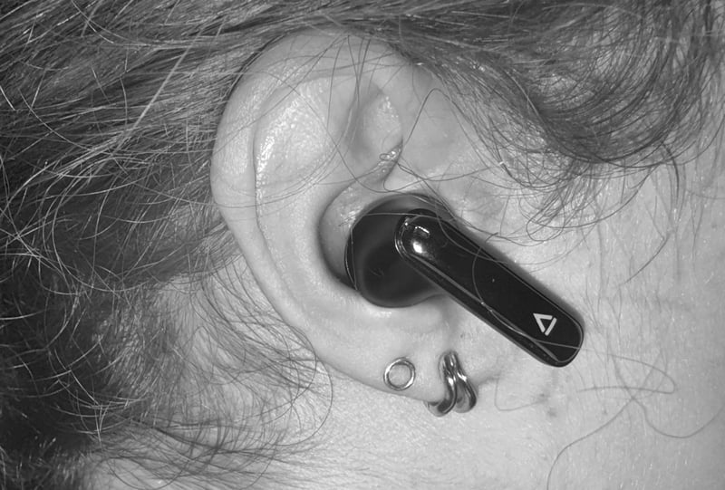 Creative Aurvana Ace 3 close up in womans ear
