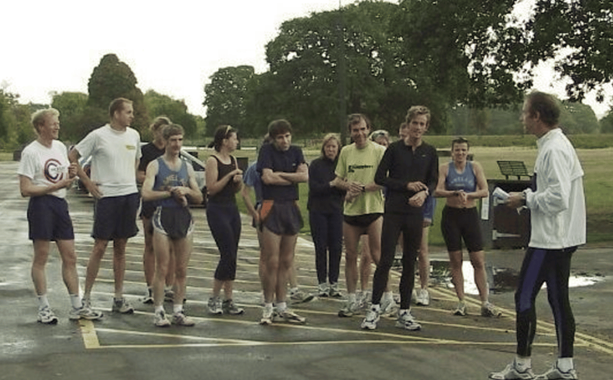 Founder Paul Sinton-Hewitt (right), leading the first Bushy Park Time Trial - the forerunner to parkrun - in Bushy Park's Diana Fountain car park, south-west London: 13 original runners shown are Chris OWENS, Matthew MORGAN, John KIPPS, Andrew LANE, Steve ROWLAND, Peter WRIGHT, Rachel ROWAN, James RUSSELL, Rachel STANHOPE, Karen WEIR, Julie DRUMMOND, Tanya WOLKEN, Simon LAWRENCE