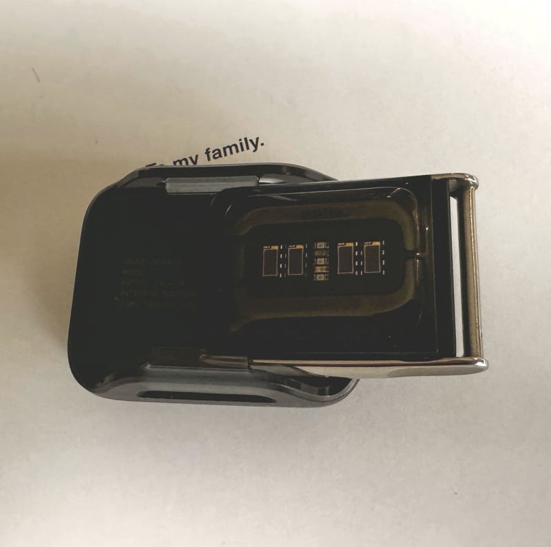 whoop 50 mg inserted in charging puck