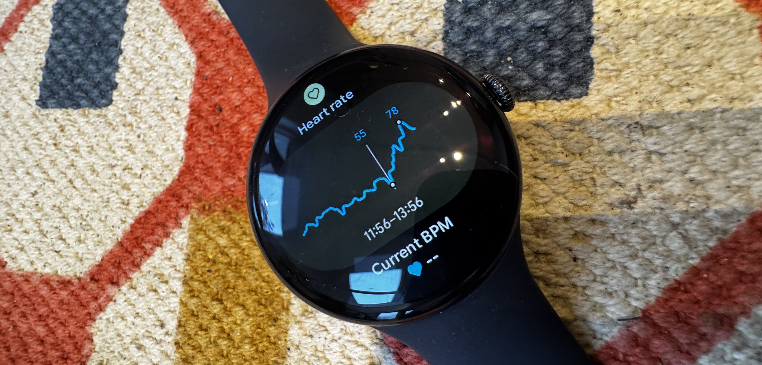 Google Pixel Watch 4 displaying 24-hour heart rate data used by Fitbit Gemini AI Coach