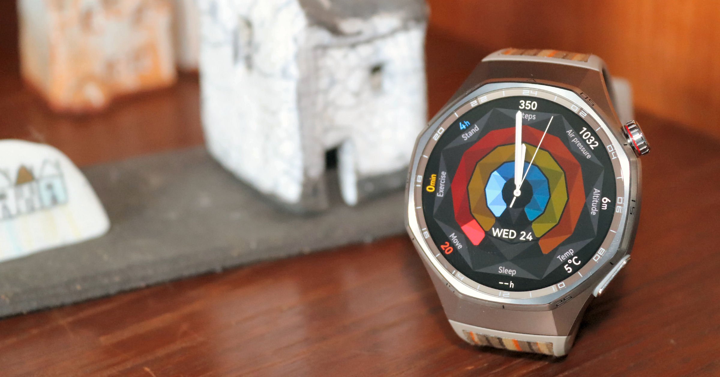 Huawei Watch GT 6 Pro review showing octagonal titanium case and sapphire glass close-up