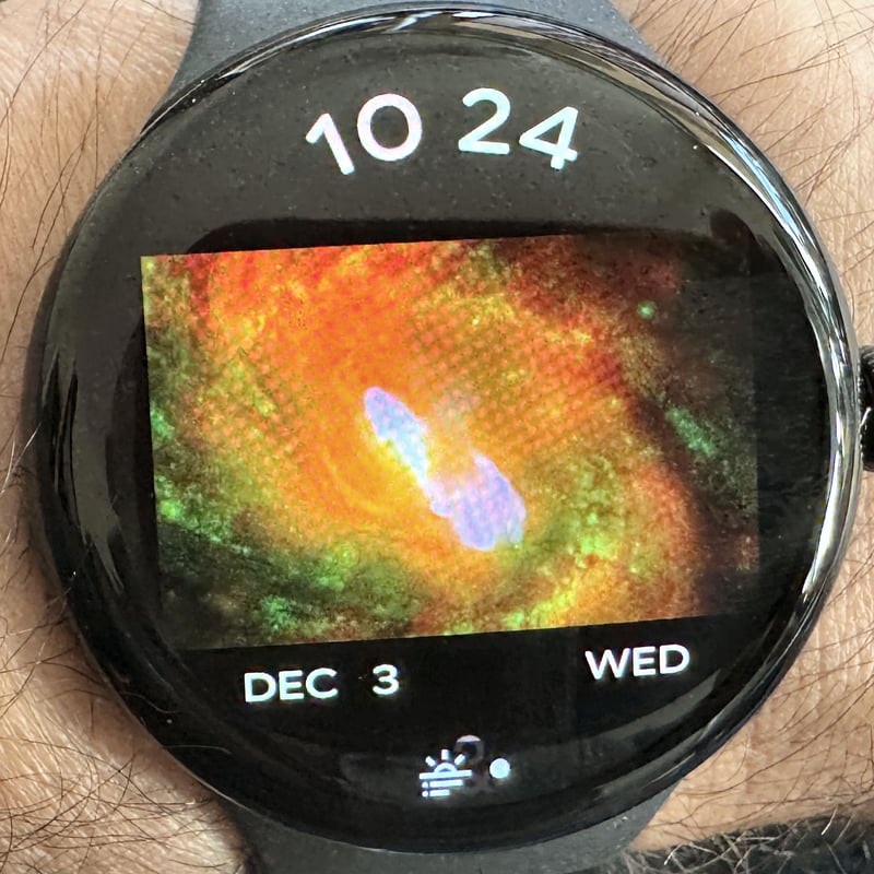 Pixel Watch 4 Arts and Culture Watch Face displaying a classic painting with the time