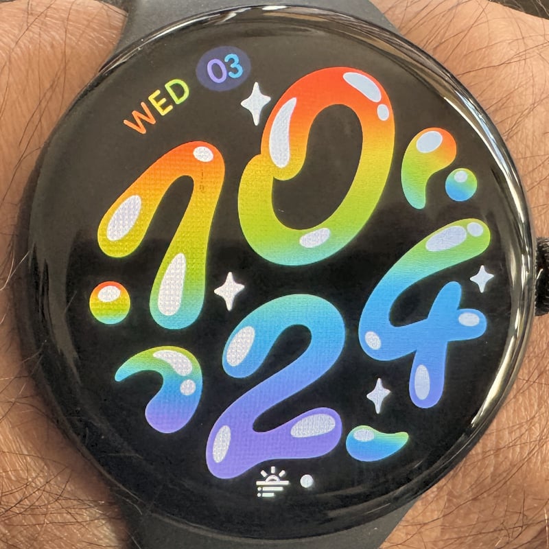 Pixel Watch 4 Colourform Watch Face showing a multicoloured, abstract gradient background