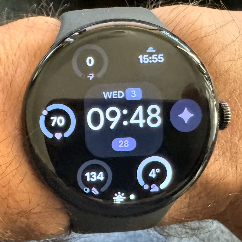 Pixel Watch 4 Reveal Watch Face with animated clock elements revealing the digital time