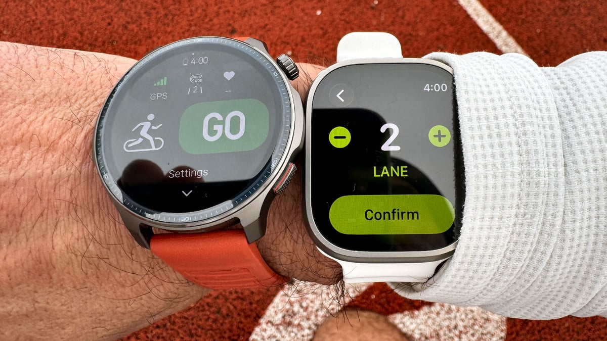 Apple Watch Ultra 3 and Amazfit Balance 2 configured in track mode for GPS accuracy testing on running track