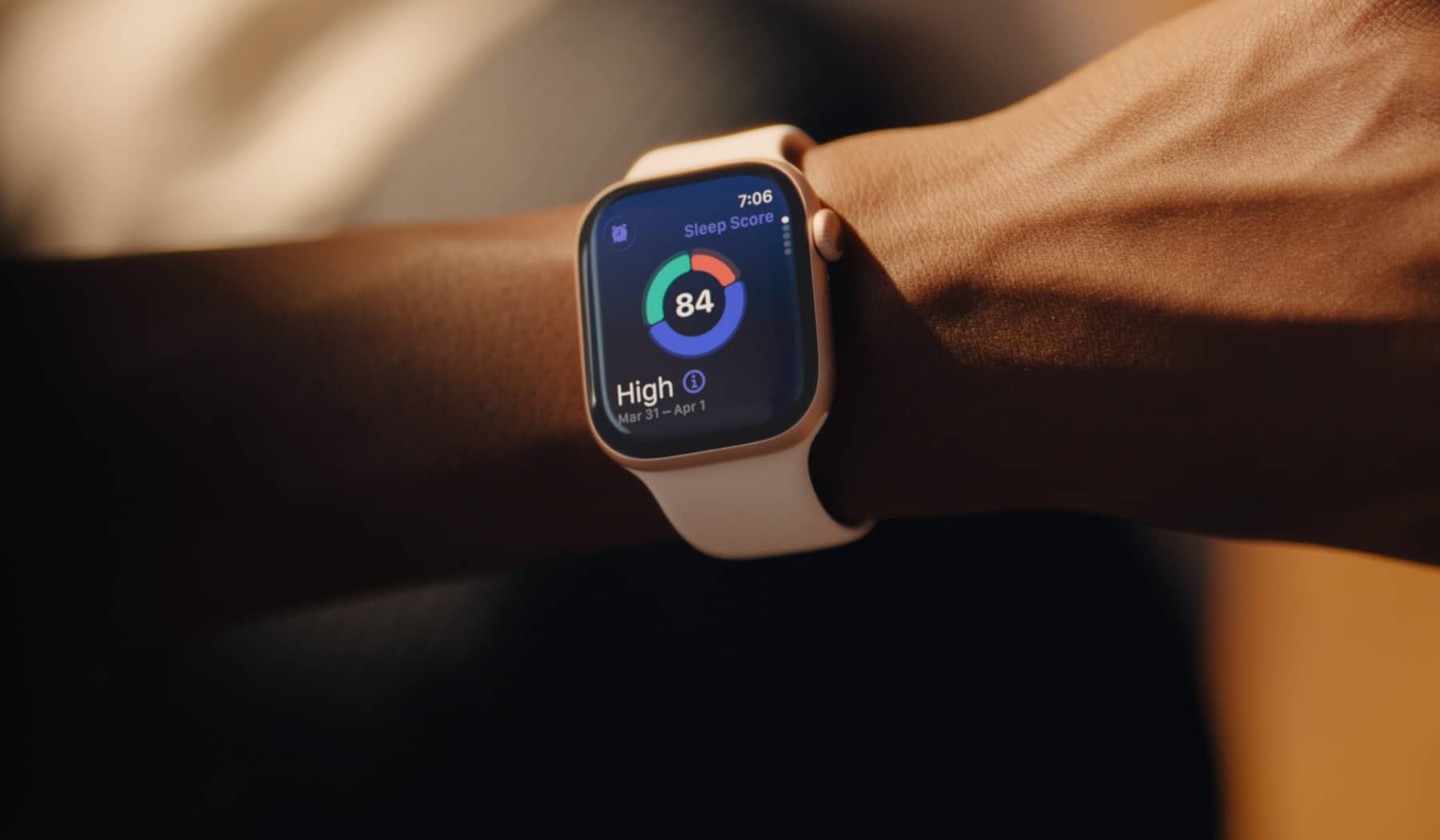 Woman checking sleep score on Apple Watch Series 11