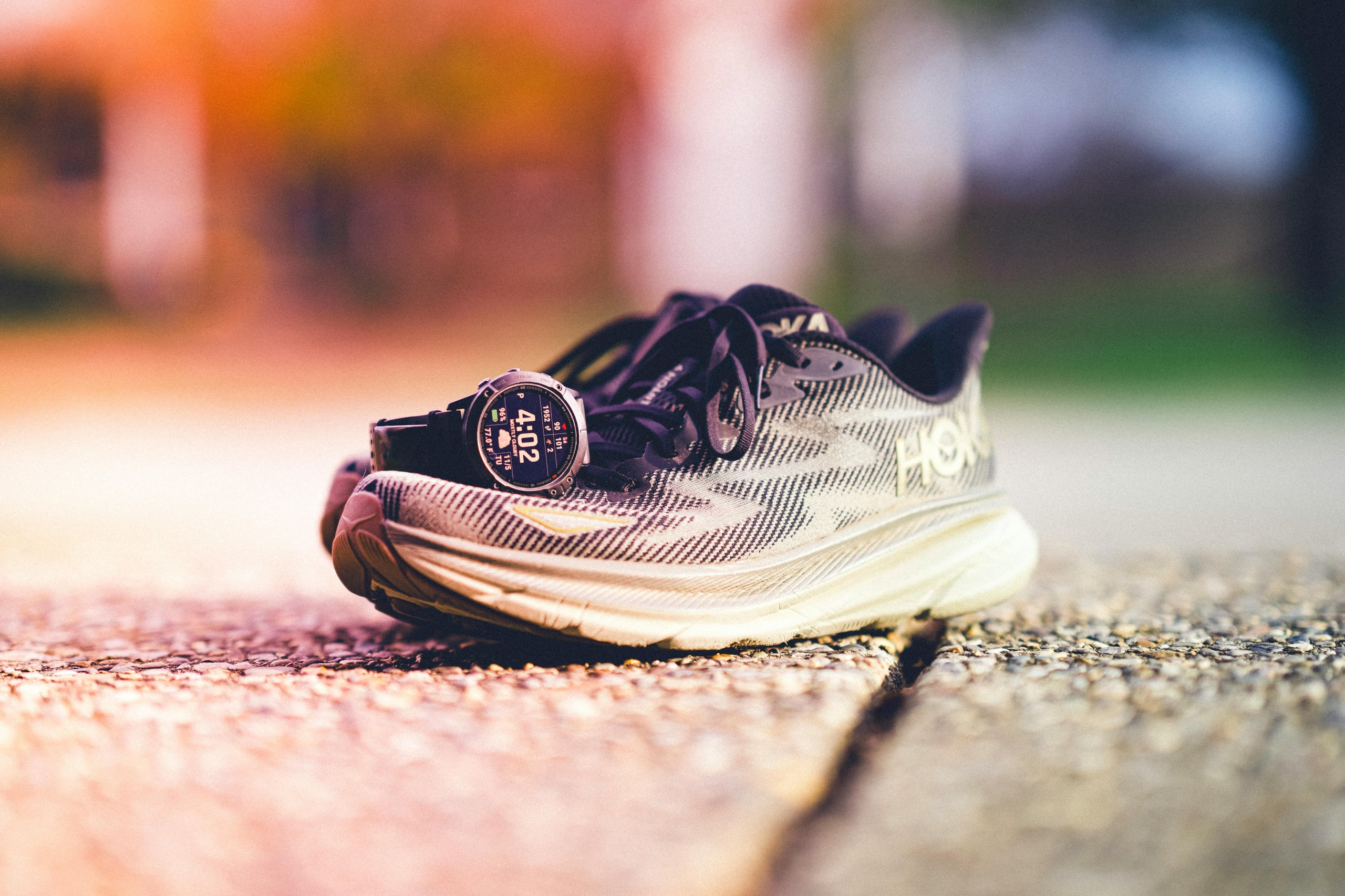 Photo by Jason Morrison: https://www.pexels.com/photo/running-shoes-with-smartwatch-on-sunny-day-29300647/