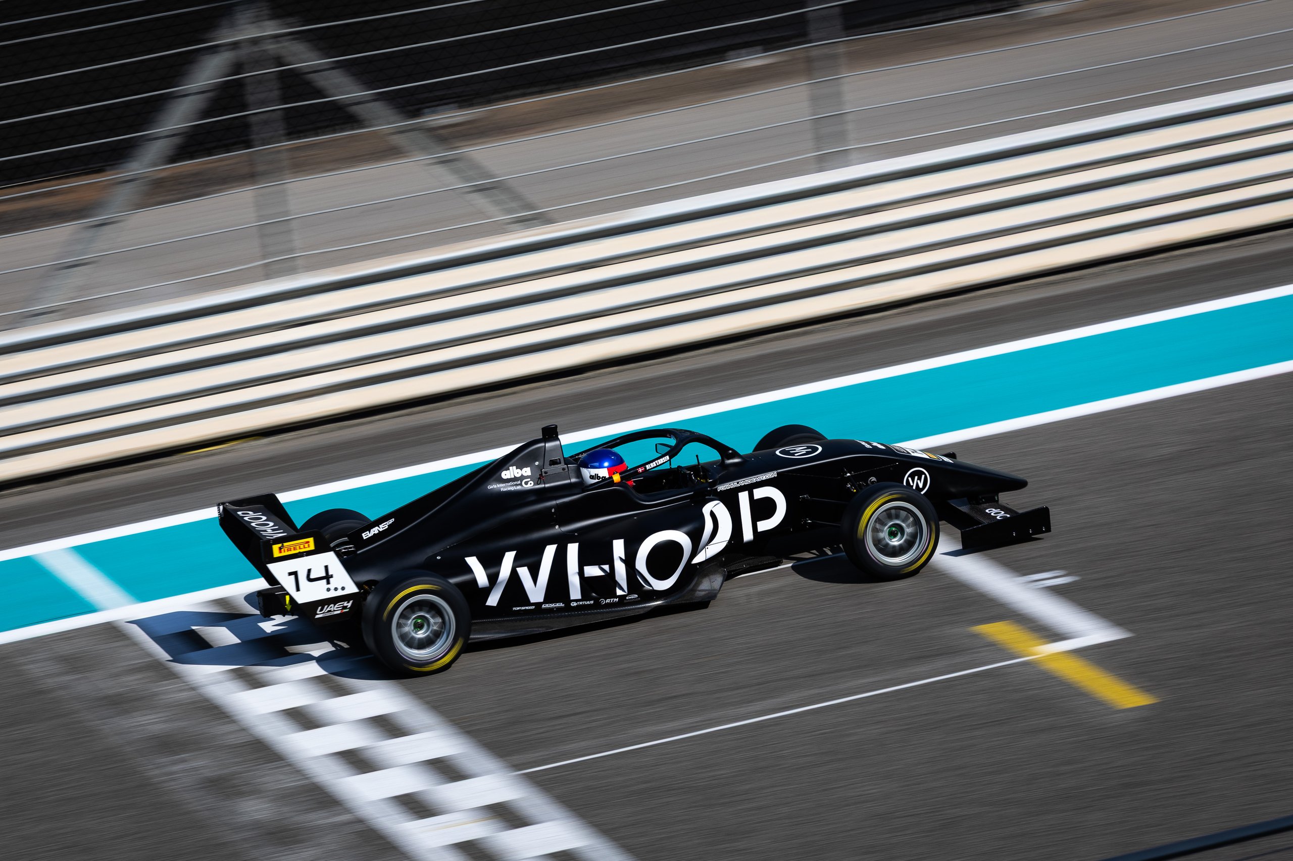 Whoop Ferrari F1 2026 partnership — Alba Larsen testing at Yas Marina Circuit pre-season, January 2026