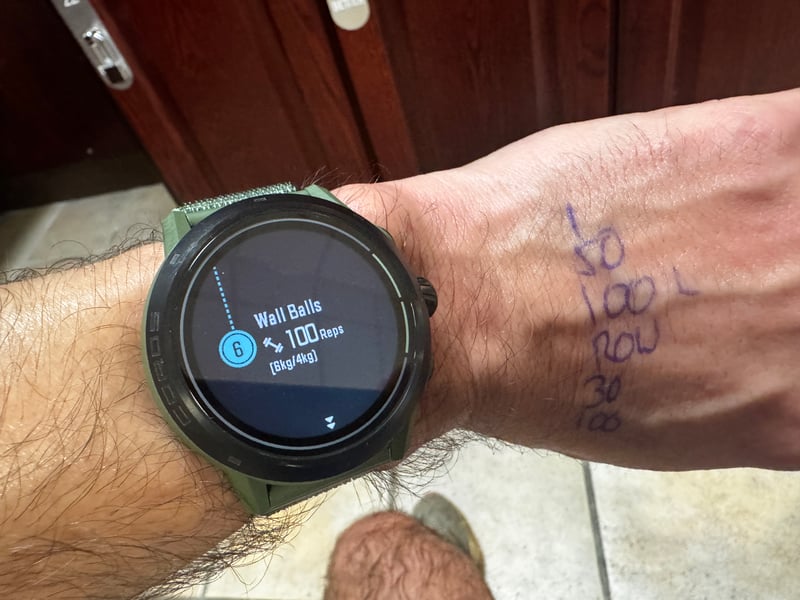 Coros watch pre-start screen showing the wall ball exercise preview before the PFT Test begins