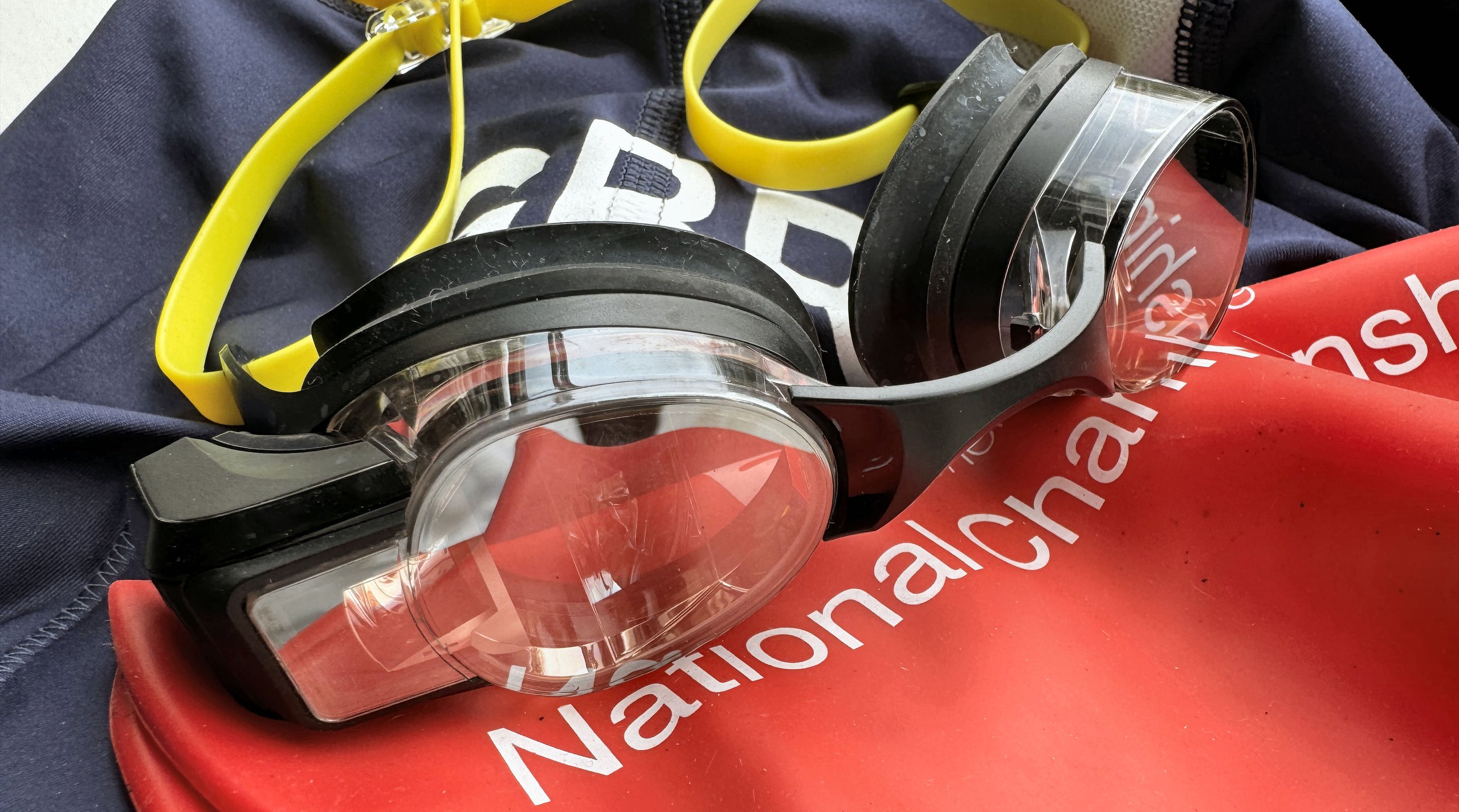 FORM Smart Swim 2 LT goggles on GBR age group tri-suit and English National Triathlon swim hat
