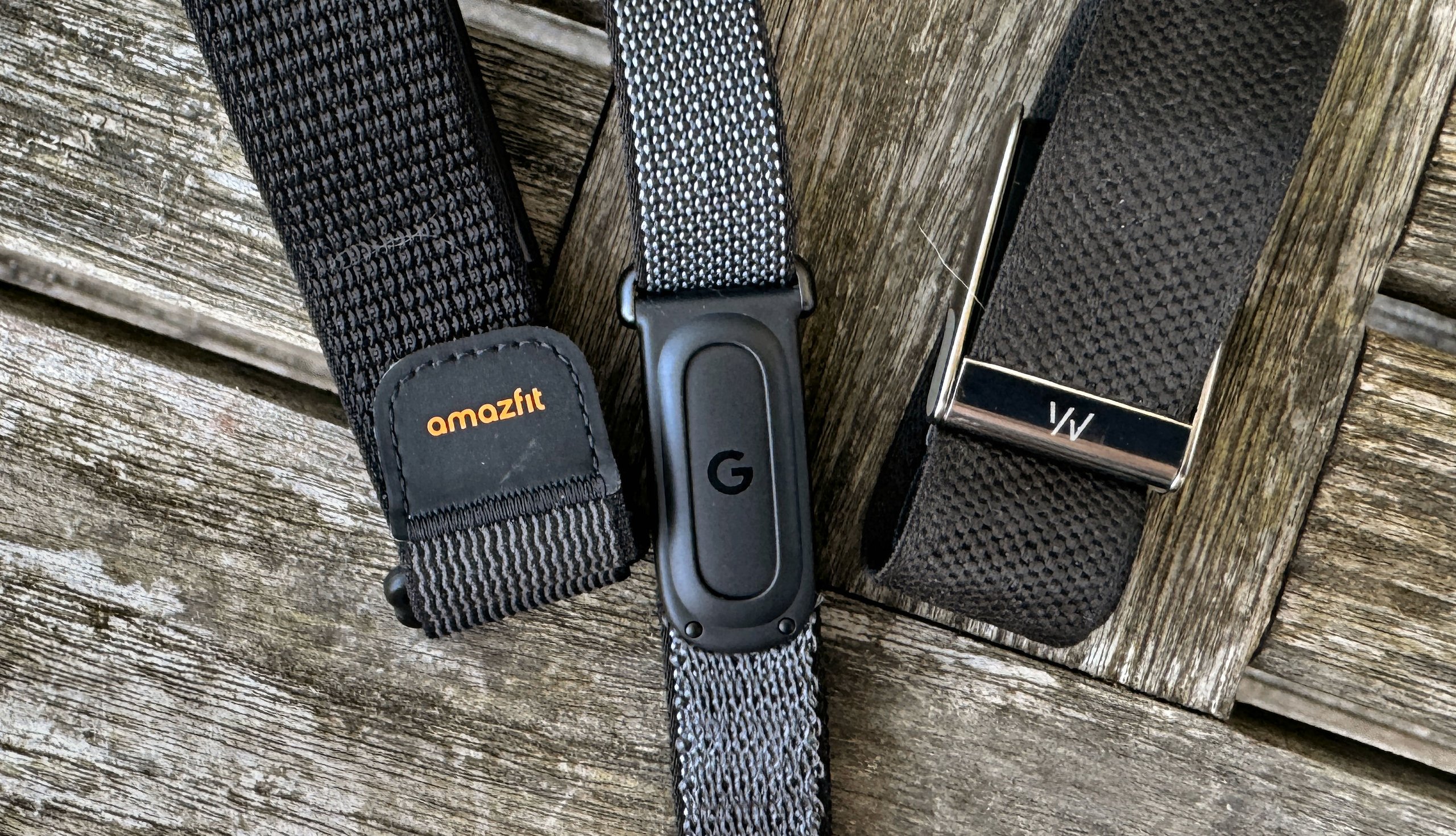 Google Fitbit Air shown next to Whoop MG and Amazfit Helio Strap.JPG