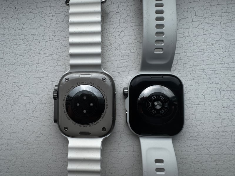 Huawei Watch fit 5 Pro vs Apple Watch Ultra 3 comparising underside view of optical sensor arrays