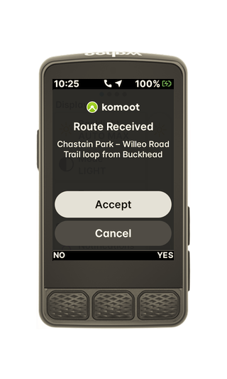 Wahoo ELEMNT showing Komoot Live Sync mid-ride update prompt to accept the revised route