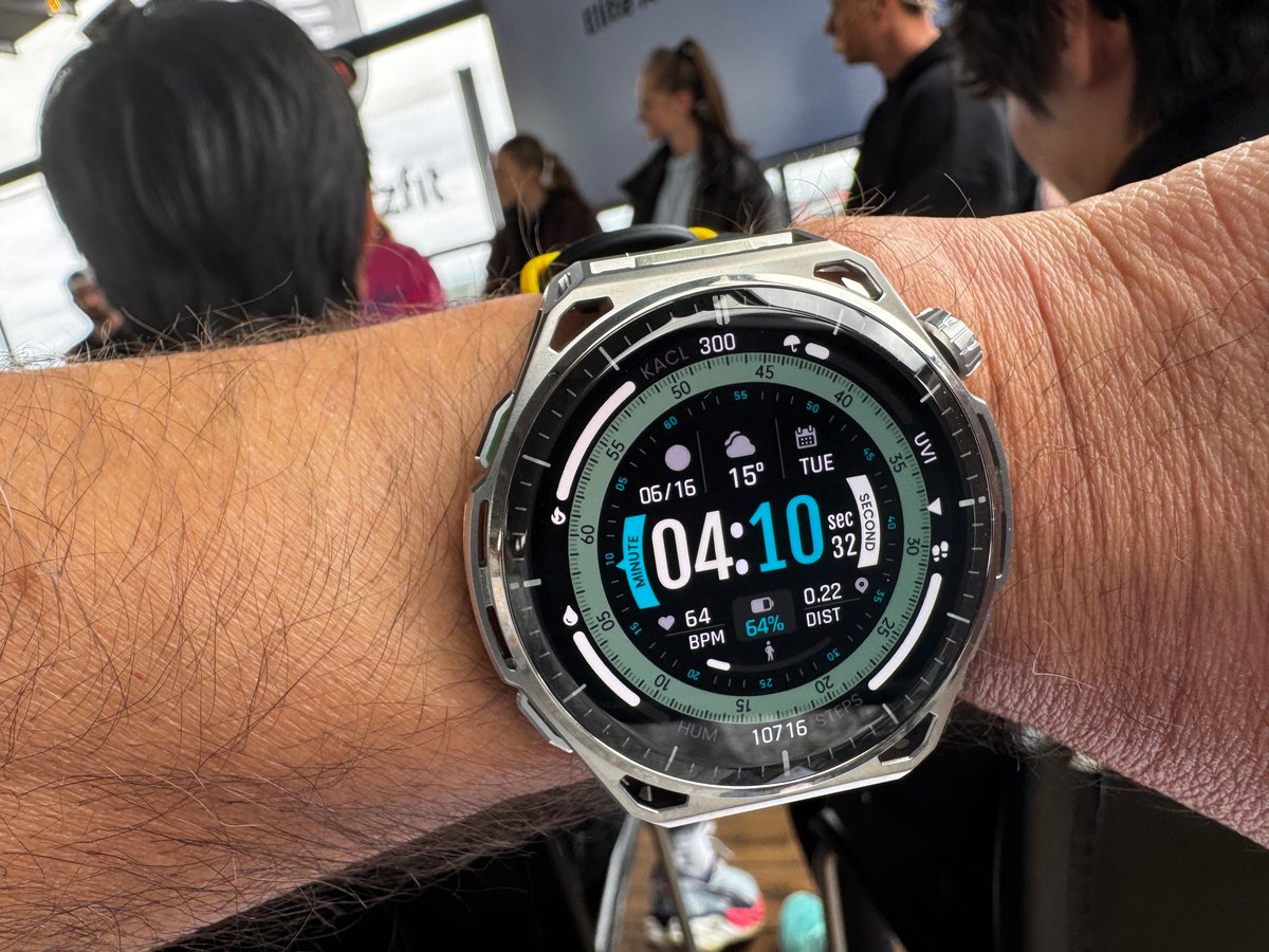 Amazfit Balance 3 on wrist at HYROX product presentation with world champions in background