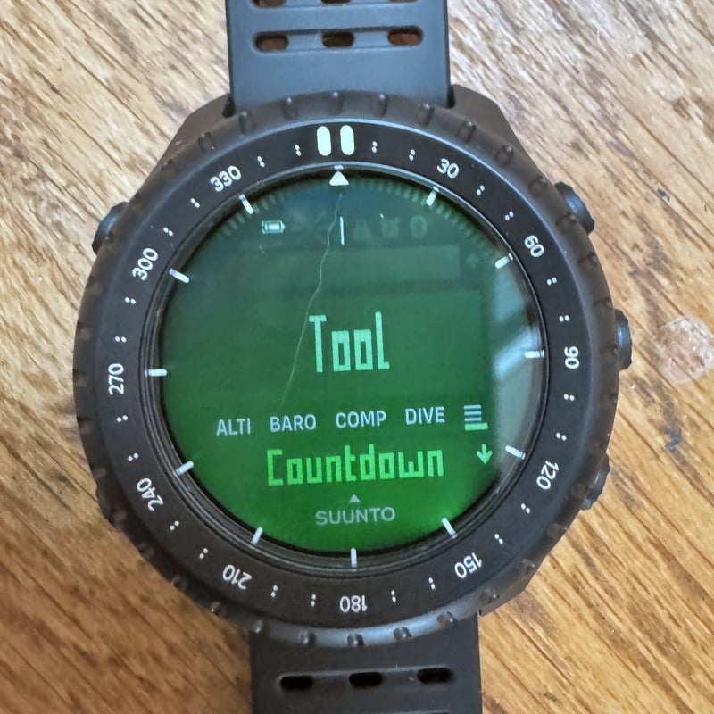 Suunto Core 2 tool menu screen showing altimeter, barometer and compass options
