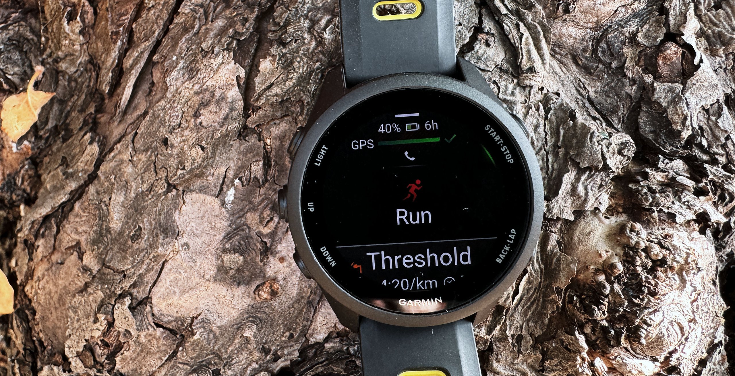 Garmin Forerunner 70 showing a run profile on its AMOLED display