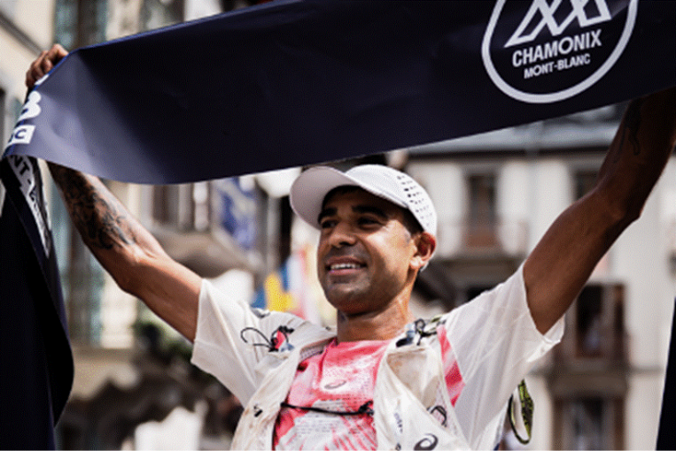 Ben Dhiman crossing the UTMB 2026 finish line in Chamonix