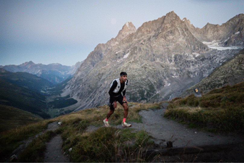 Ben Dhiman running the UTMB 2026 course through the mountains