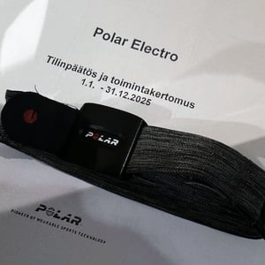 Polar financial year ending 2025 financial results header page with polar device on top