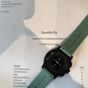 Suunto oy finnacial results header page with polar run 2 sitting on top