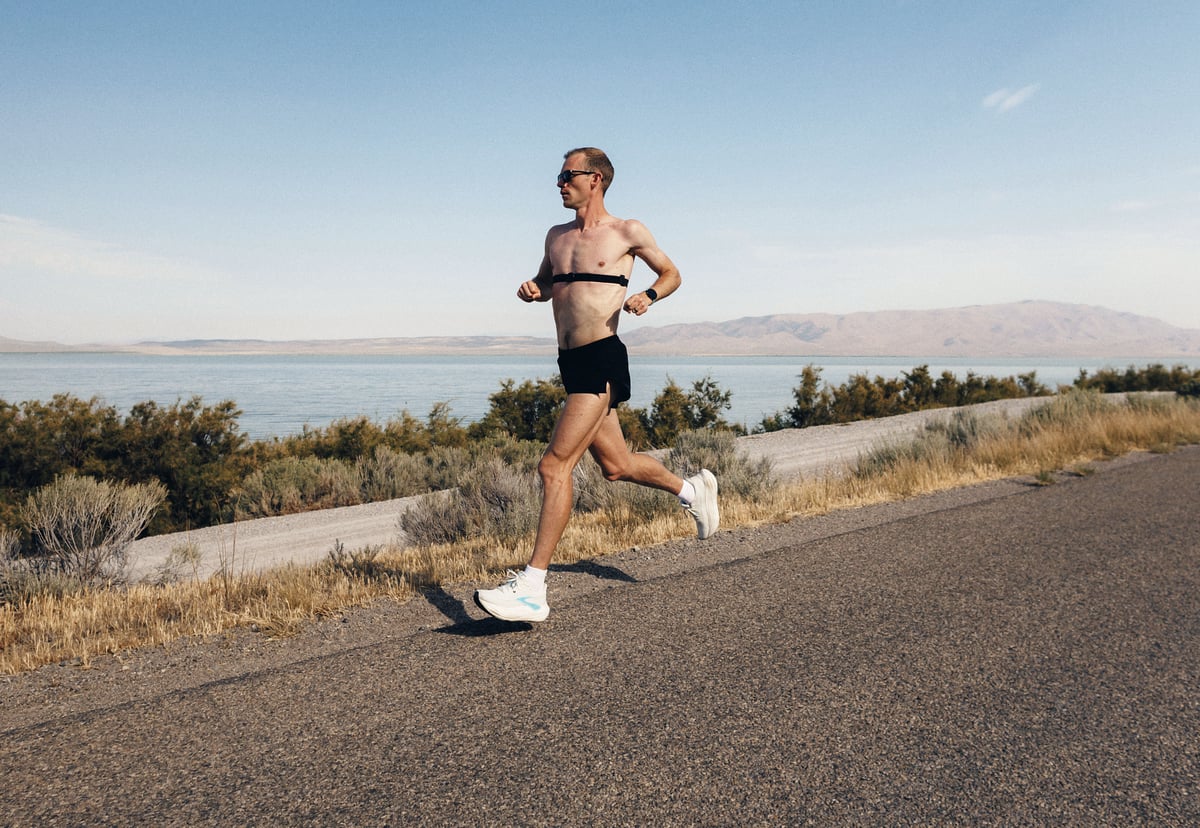 Suunto Smart Heart Rate Belt 2 worn by a runner on a trail run