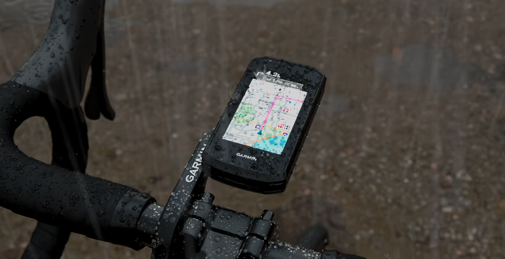 garmin edge explore 3 on bars out front in rain hero