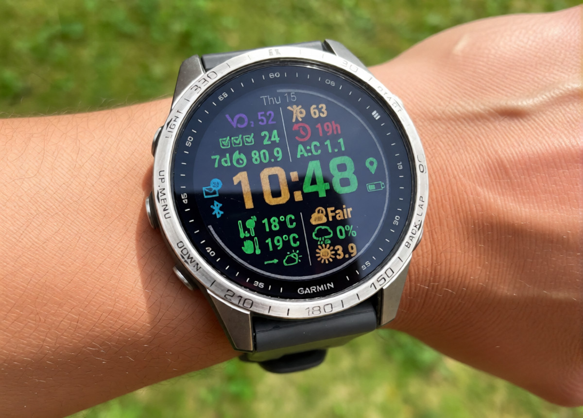 Ready to Run Garmin watch face on a runner's wrist showing body readiness, goals and weather with WBGT