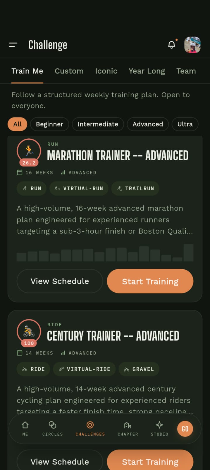 Saval Train Me week-by-week half marathon plan on a phone, with scheduled sessions ticked off as they are completed