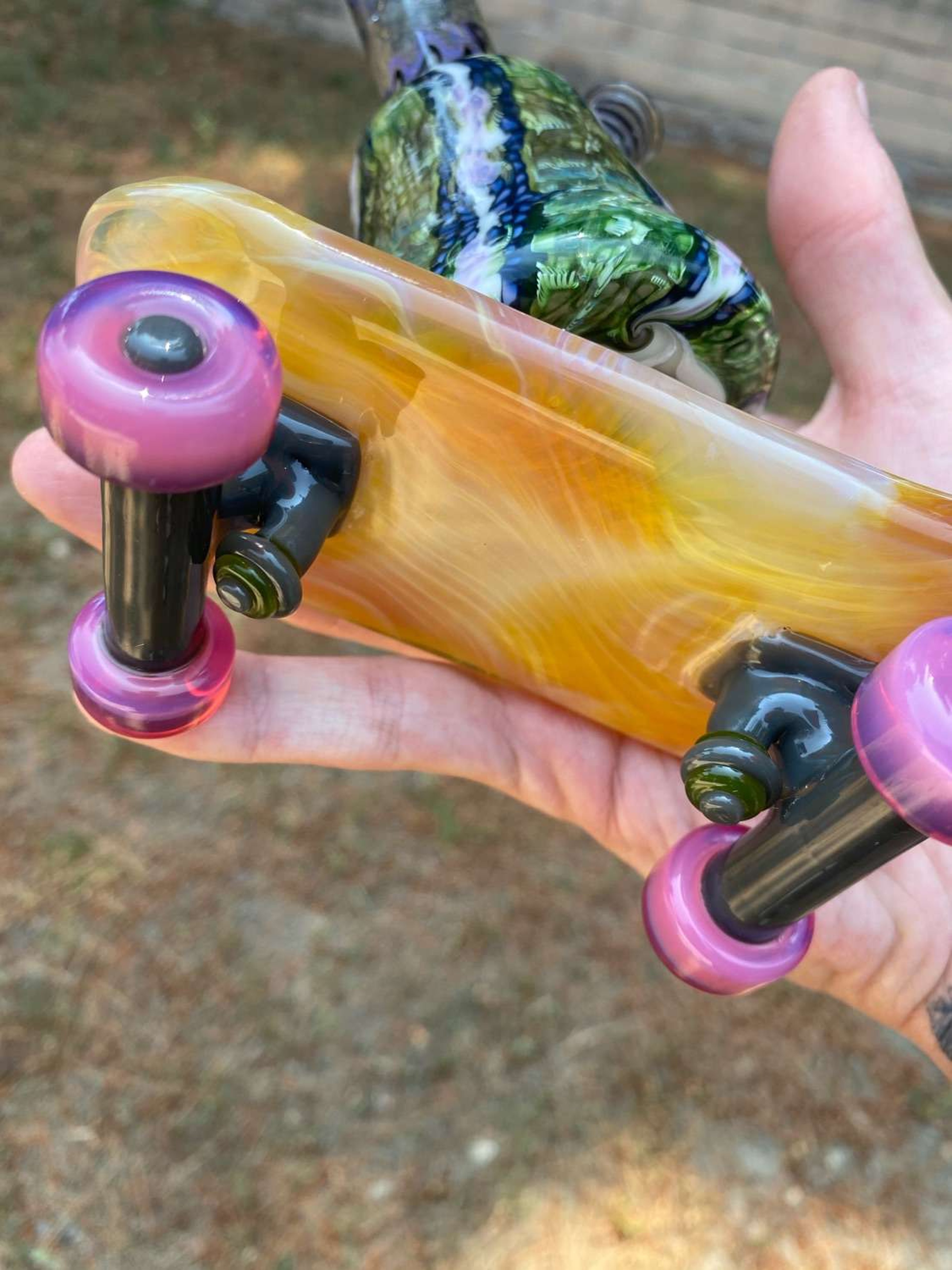 Quinn glasa mini tube on a glass skateboard with matching carb cap image 0