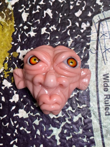 Preview pic of kaleb folk face pendant