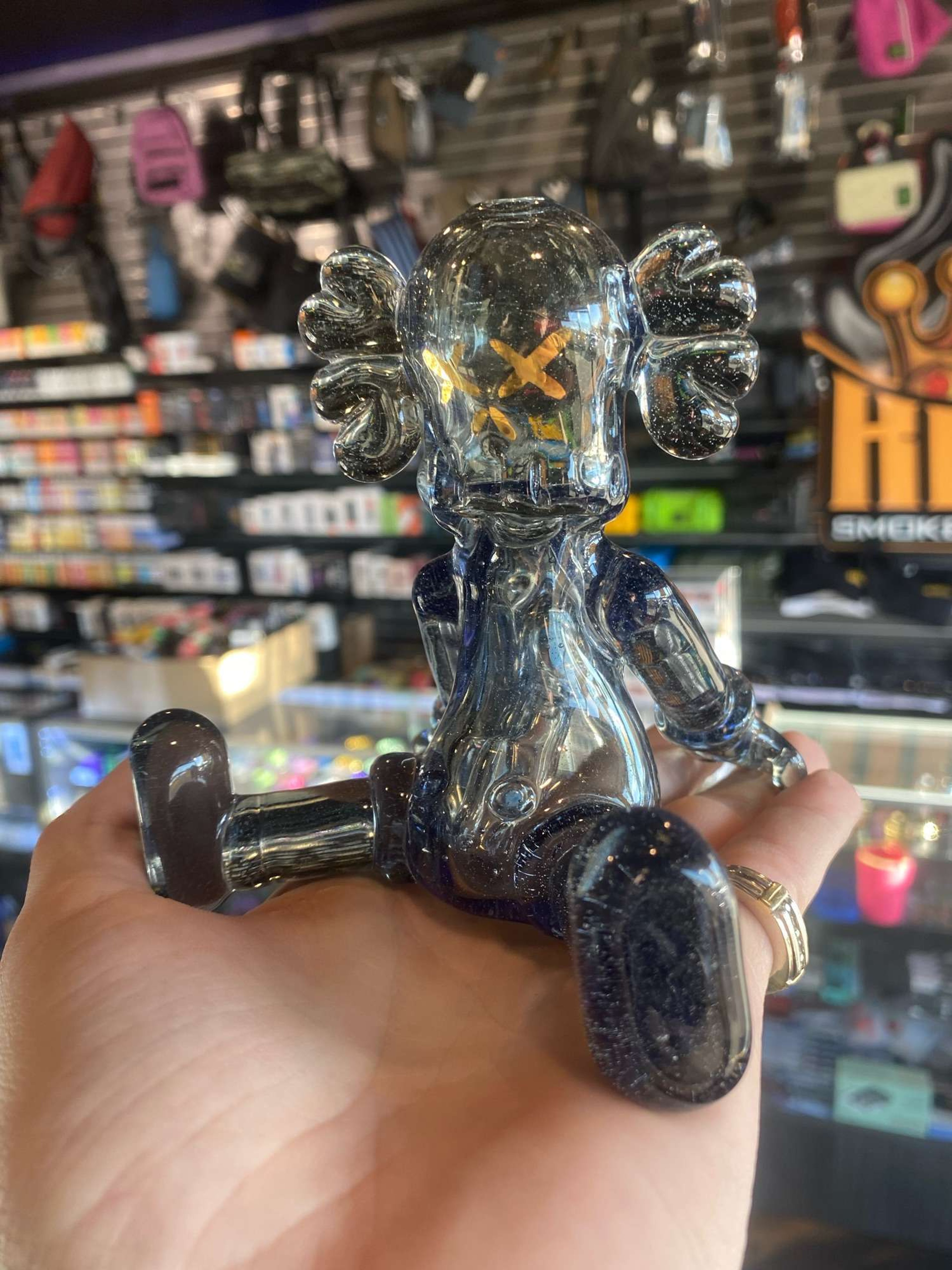 Preview pic of Mor Glass sitting Kaws