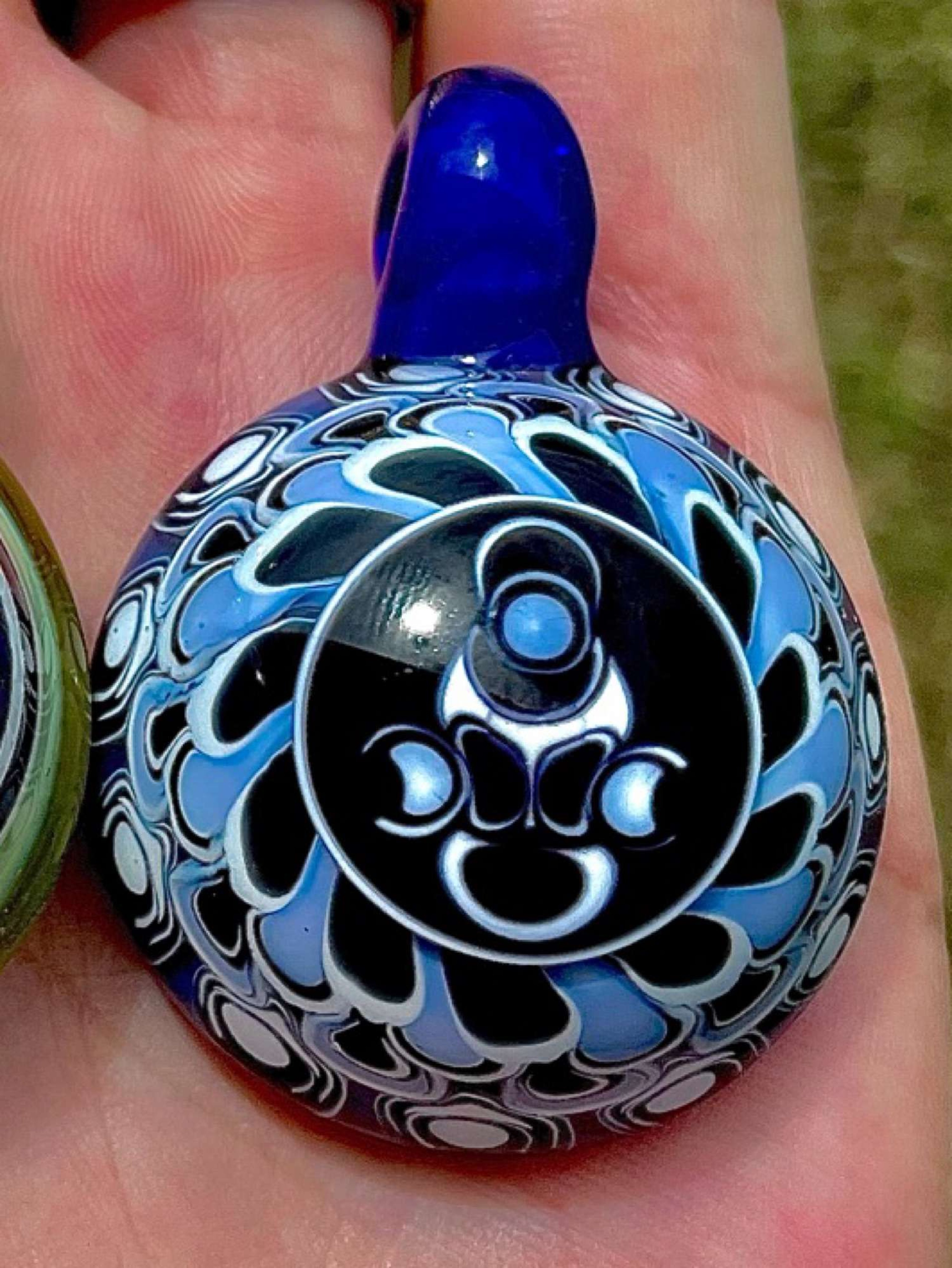 WR Glass Aztec Flower Warrior Pendant #2 image 0