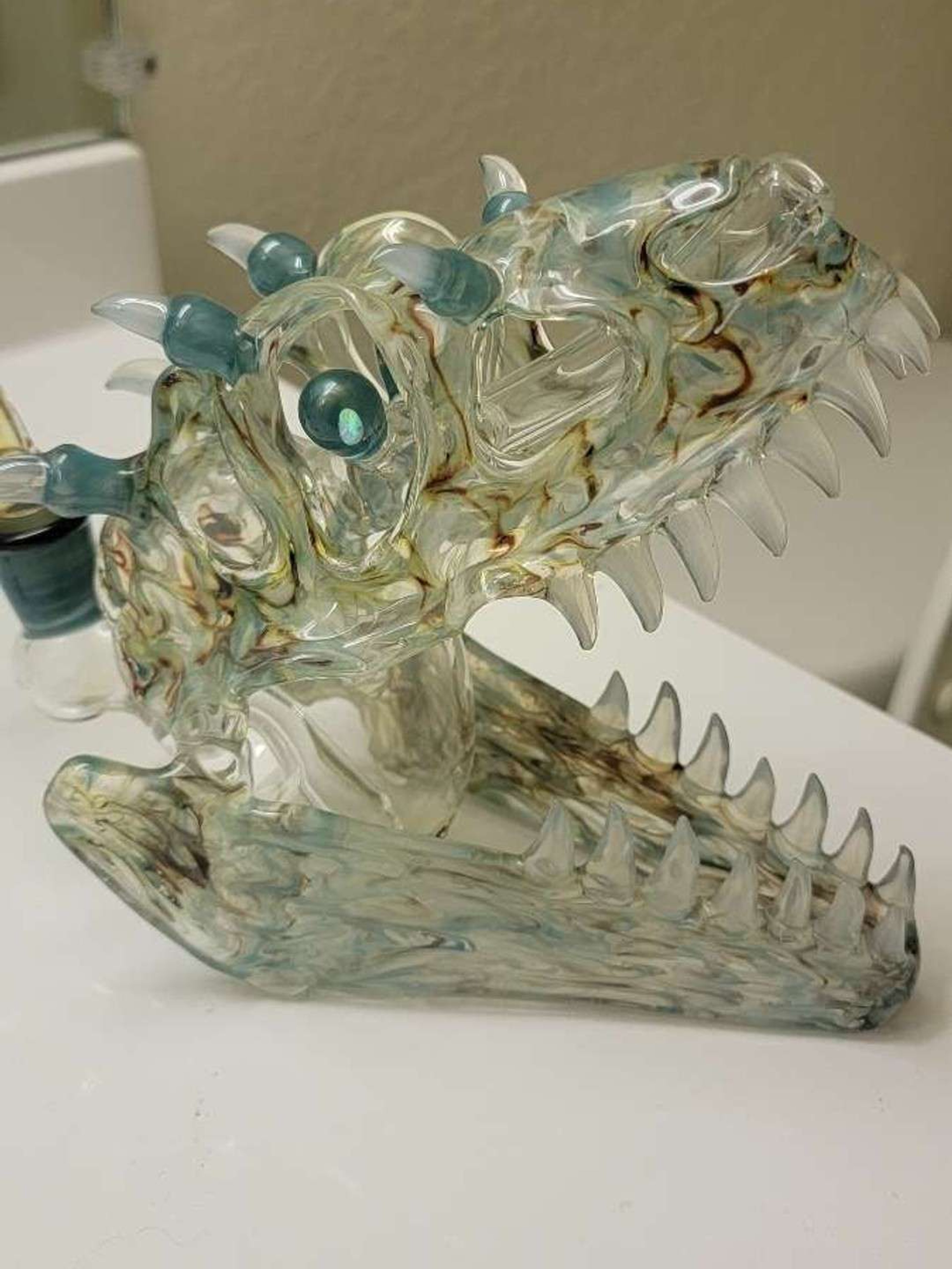Preview pic of Slurm glass dinosaur skull